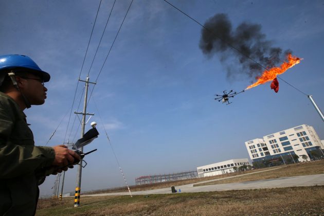 Fire-spewing Drone Burns Trash Stuck on Power Lines