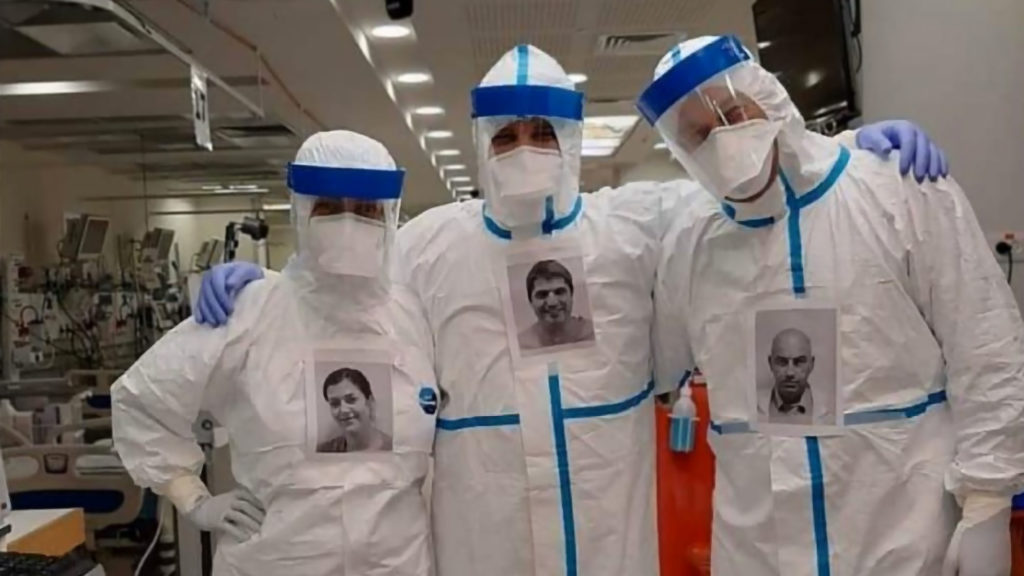 Healthcare Workers Have Smiling Photos On PPE