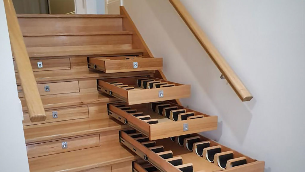 Wine Cellar Integrated into Staircase
