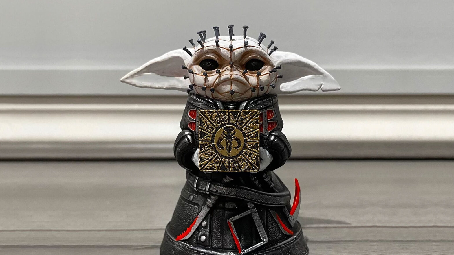 Pinhead Baby Yoda Mini Statue Still Adorable, But In A Hellish Way