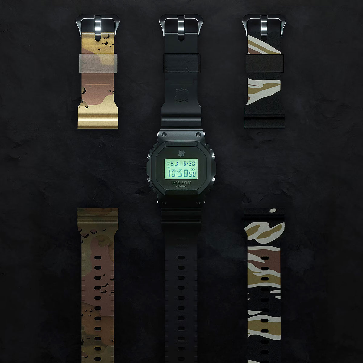 Undefeated x G-Shock DWE5600UD-1 Is Supplied With Two Extra