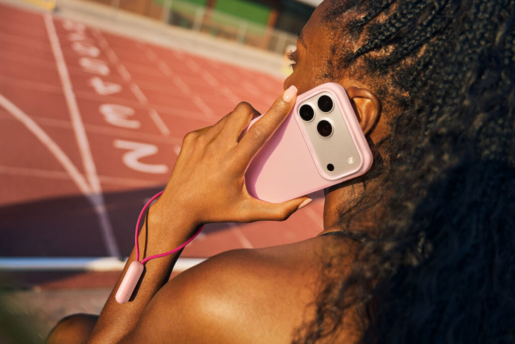 Beats Kickstand Case on iPhone 17 Pro in Pebble Pink finish