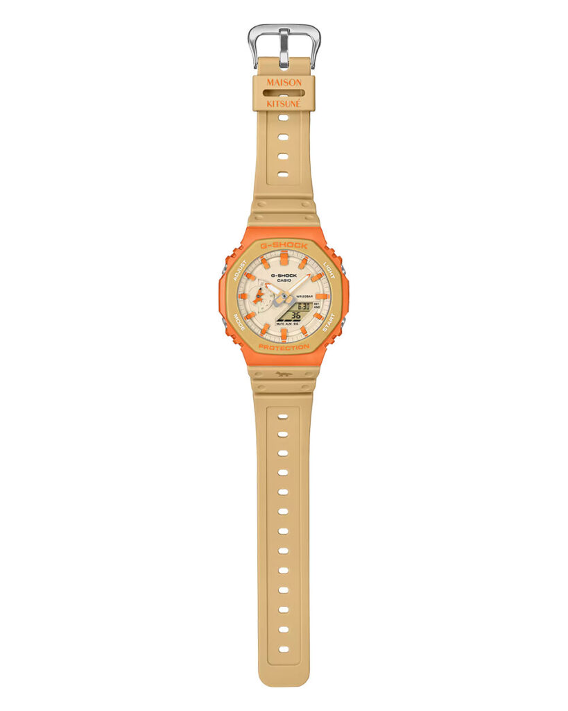G-Shock Maison Kitsuné GA2110MK-5A collaboration watch with orange bezel and neutral Paris-inspired colorway