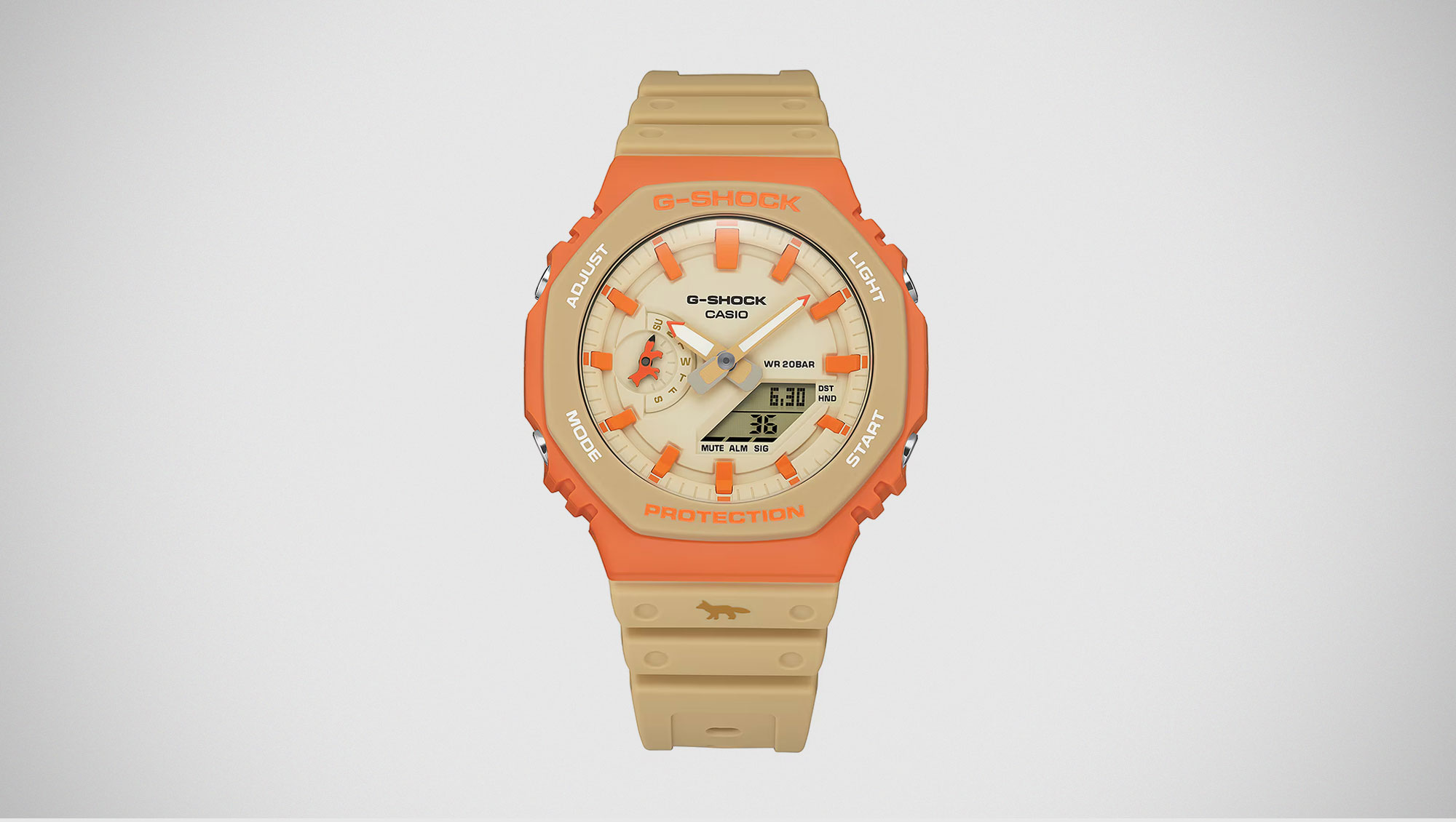 G-Shock Maison Kitsuné GA2110MK-5A collaboration watch with orange bezel and neutral Paris-inspired colorway