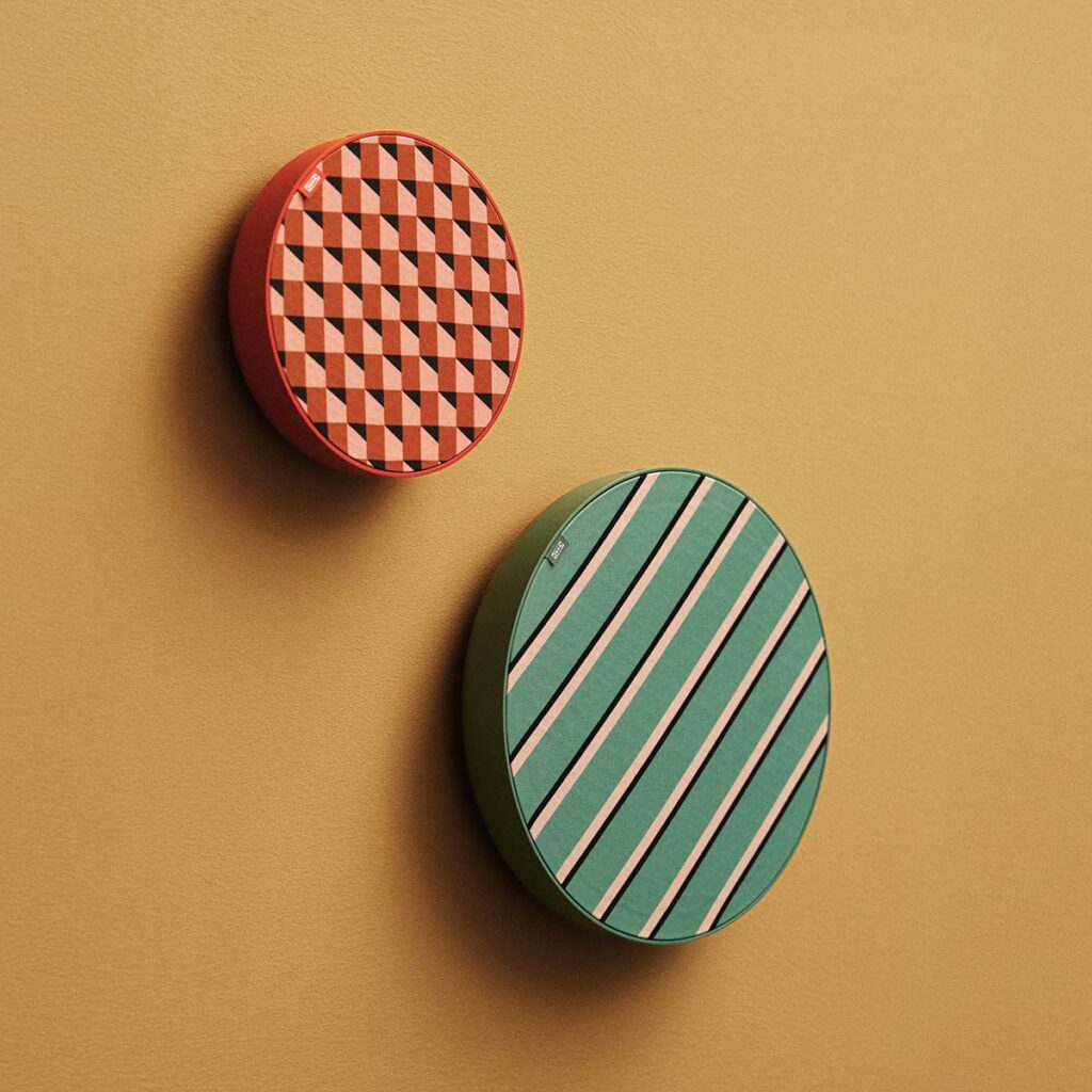 IKEA SOLSKYDD Bluetooth speakers in bold color designs by Tekla Evelina Severin mounted on a wall as decorative home audio pieces