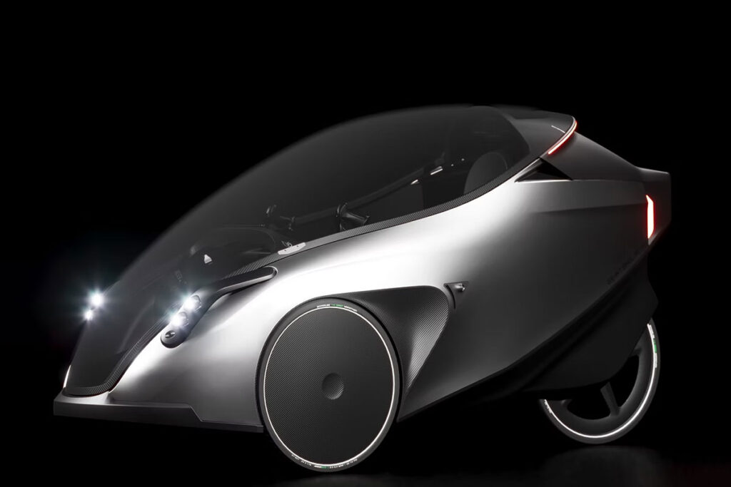 IRIS eTrike electrically assisted pedal cycle with enclosed carbon fiber cabin and panoramic canopy