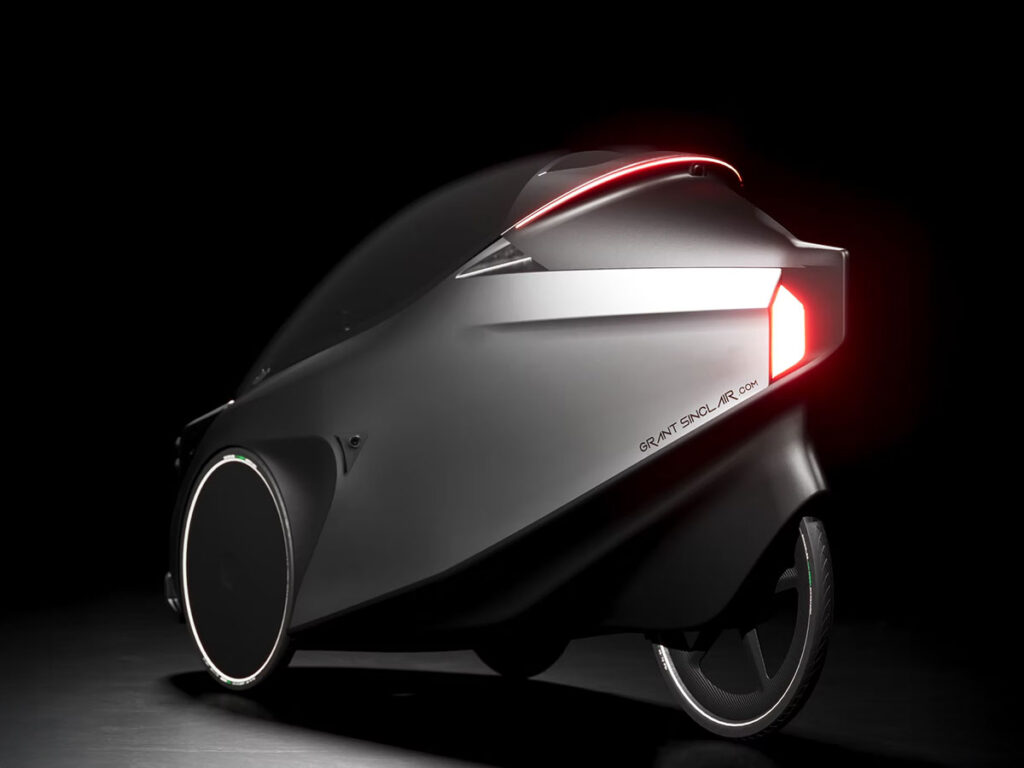 IRIS eTrike electrically assisted pedal cycle with enclosed carbon fiber cabin and panoramic canopy