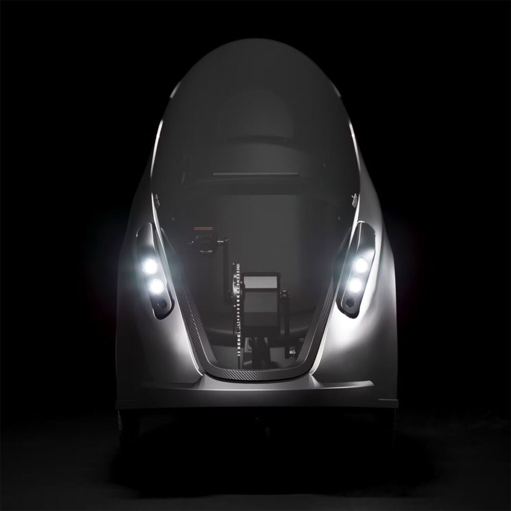 IRIS eTrike electrically assisted pedal cycle with enclosed carbon fiber cabin and panoramic canopy