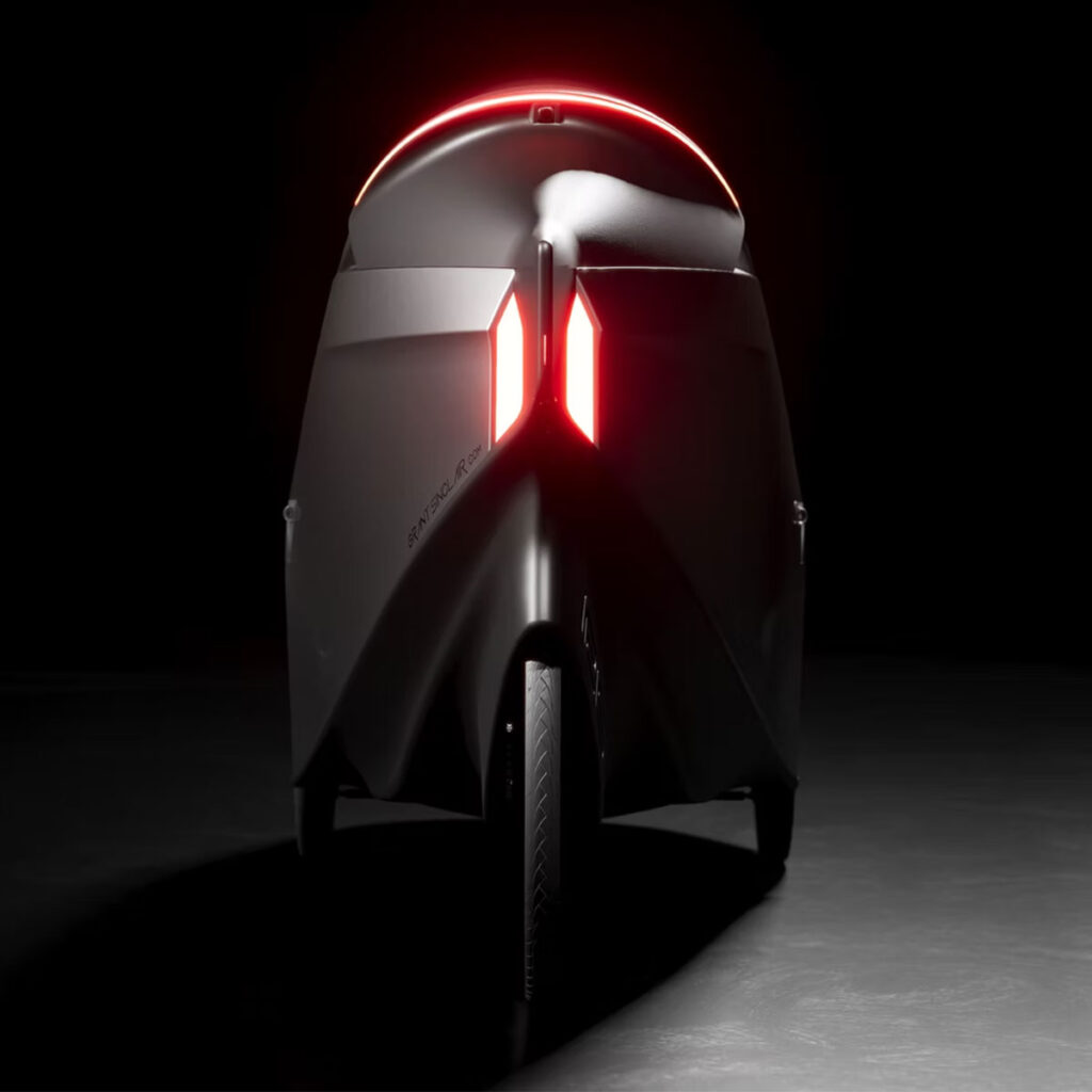 IRIS eTrike electrically assisted pedal cycle with enclosed carbon fiber cabin and panoramic canopy