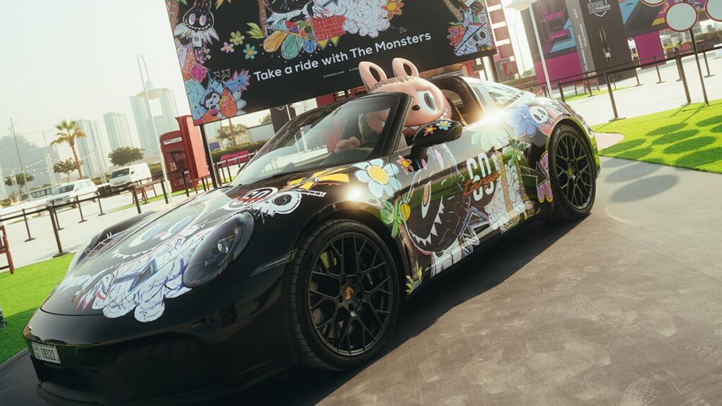 Porsche 911 Targa Labubu art car with life-size Labubu figure unveiled at Icons of Porsche 2025