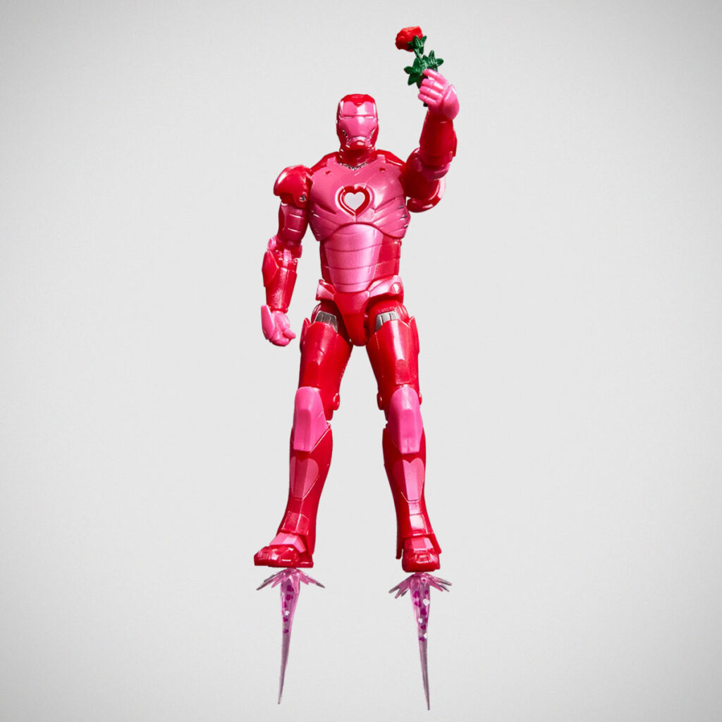 Marvel Legends I Love You 3000 Iron Man action figure holding a rose with heart-shaped Arc Reactor and pink-themed packaging
