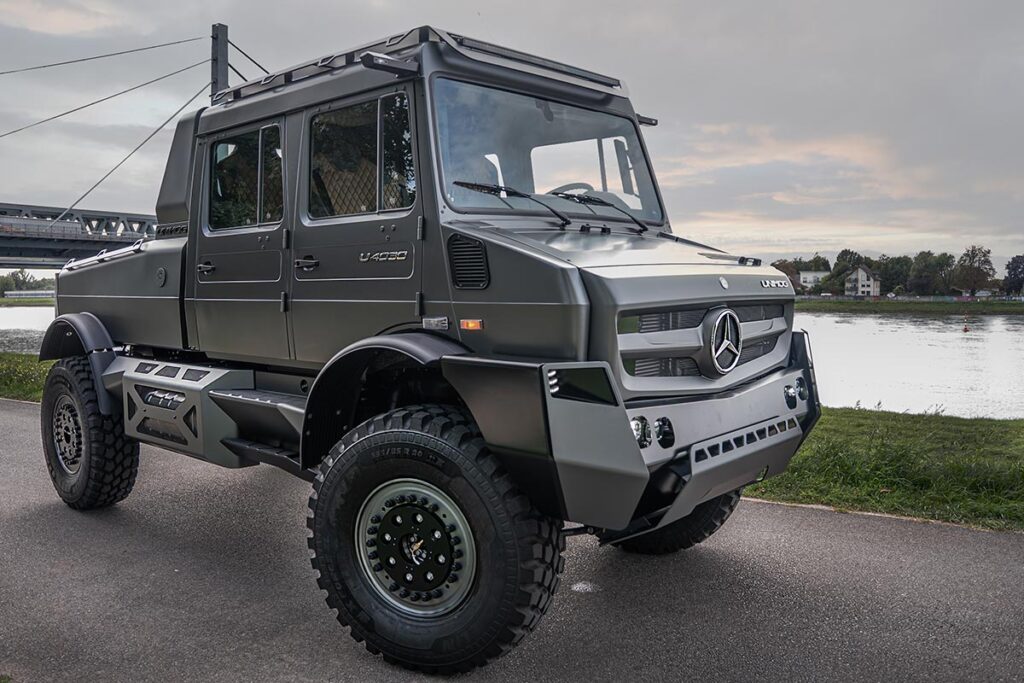 Mercedes-Benz Special Trucks luxury Unimog show car in matte grey with beadlock wheels, LED lighting, and premium off-road design