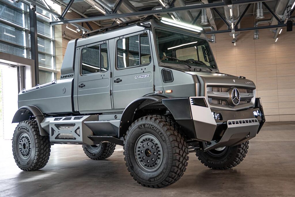 Mercedes-Benz Special Trucks luxury Unimog show car in matte grey with beadlock wheels, LED lighting, and premium off-road design