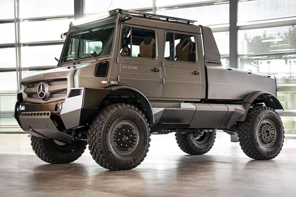 Mercedes-Benz Special Trucks luxury Unimog show car in matte grey with beadlock wheels, LED lighting, and premium off-road design
