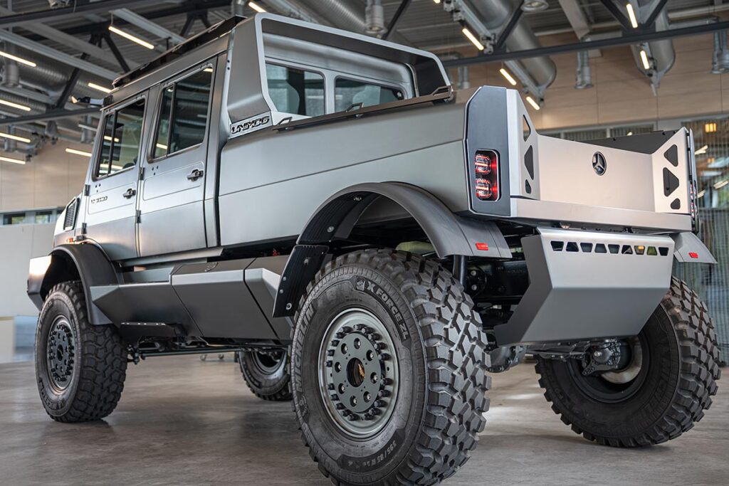Mercedes-Benz Special Trucks luxury Unimog show car in matte grey with beadlock wheels, LED lighting, and premium off-road design