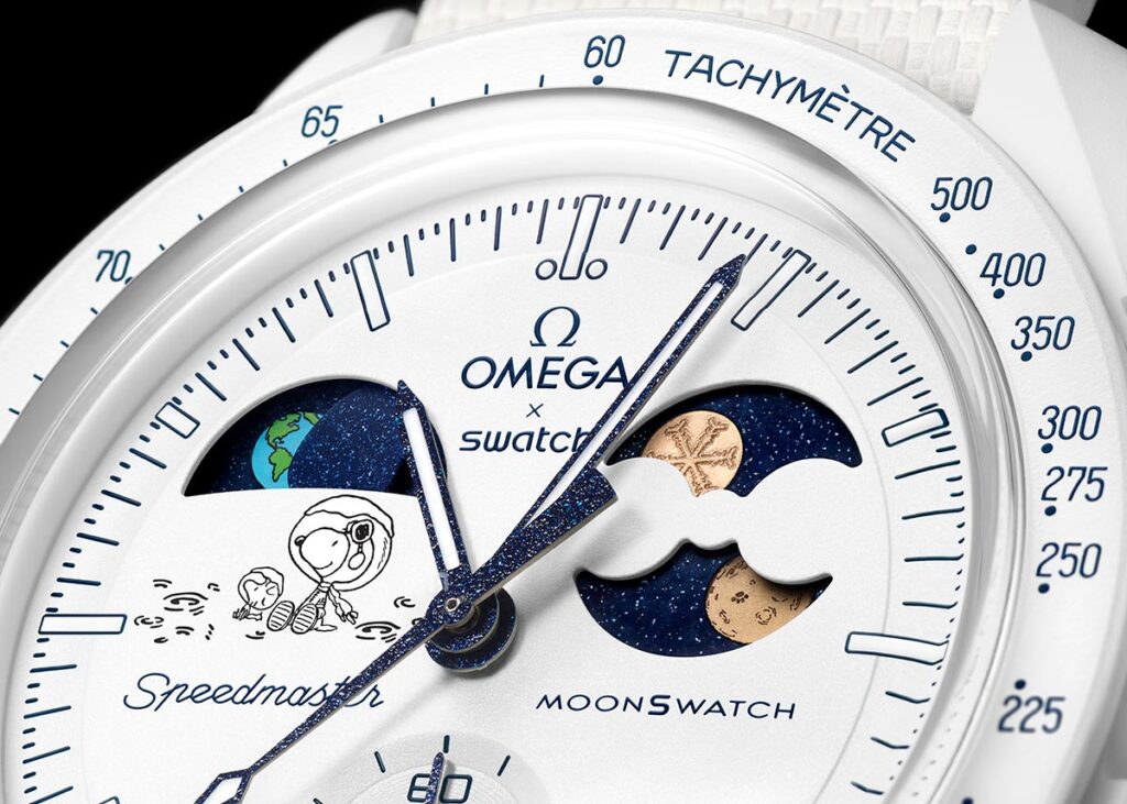 Omega x Swatch Mission to Earthphase Moonshine Gold watch with Moonshine Gold hands and snowflake-engraved moonphase indicator