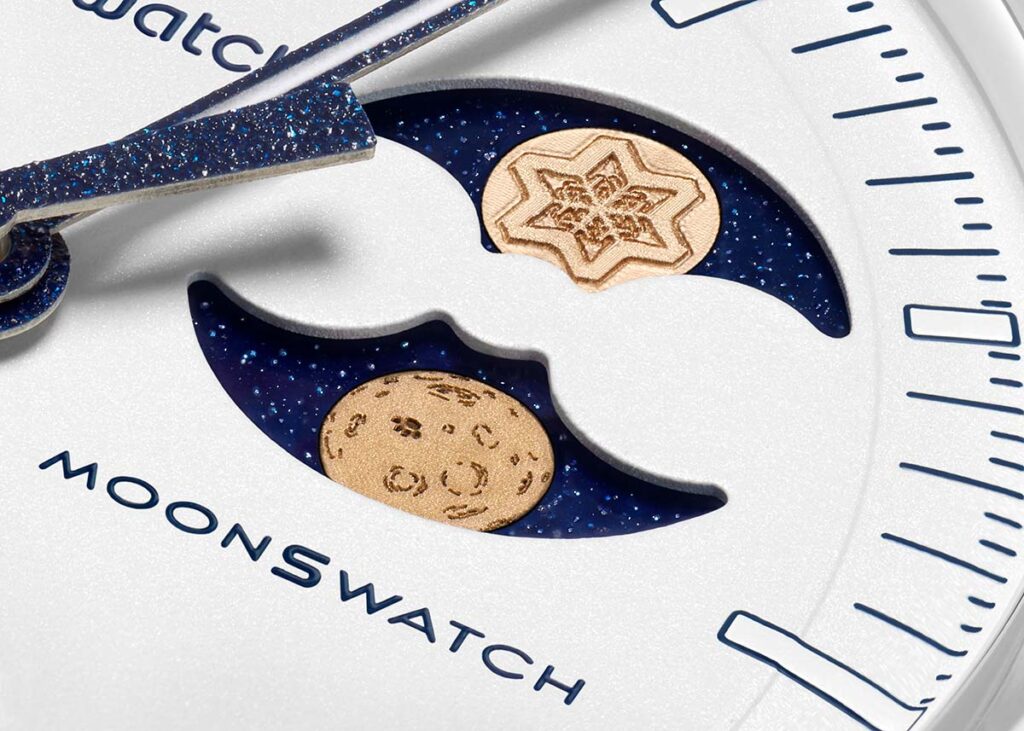 Omega x Swatch Mission to Earthphase Moonshine Gold watch with Moonshine Gold hands and snowflake-engraved moonphase indicator