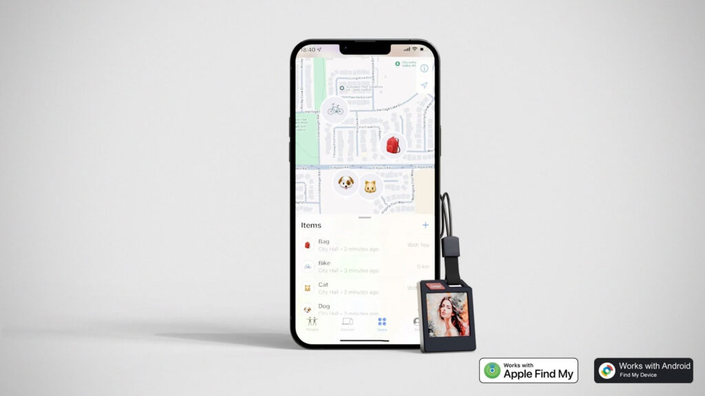 PhotoTag Bluetooth keychain tracker with color e-ink display showing a photo, compatible with Apple Find My and Android Find My Device