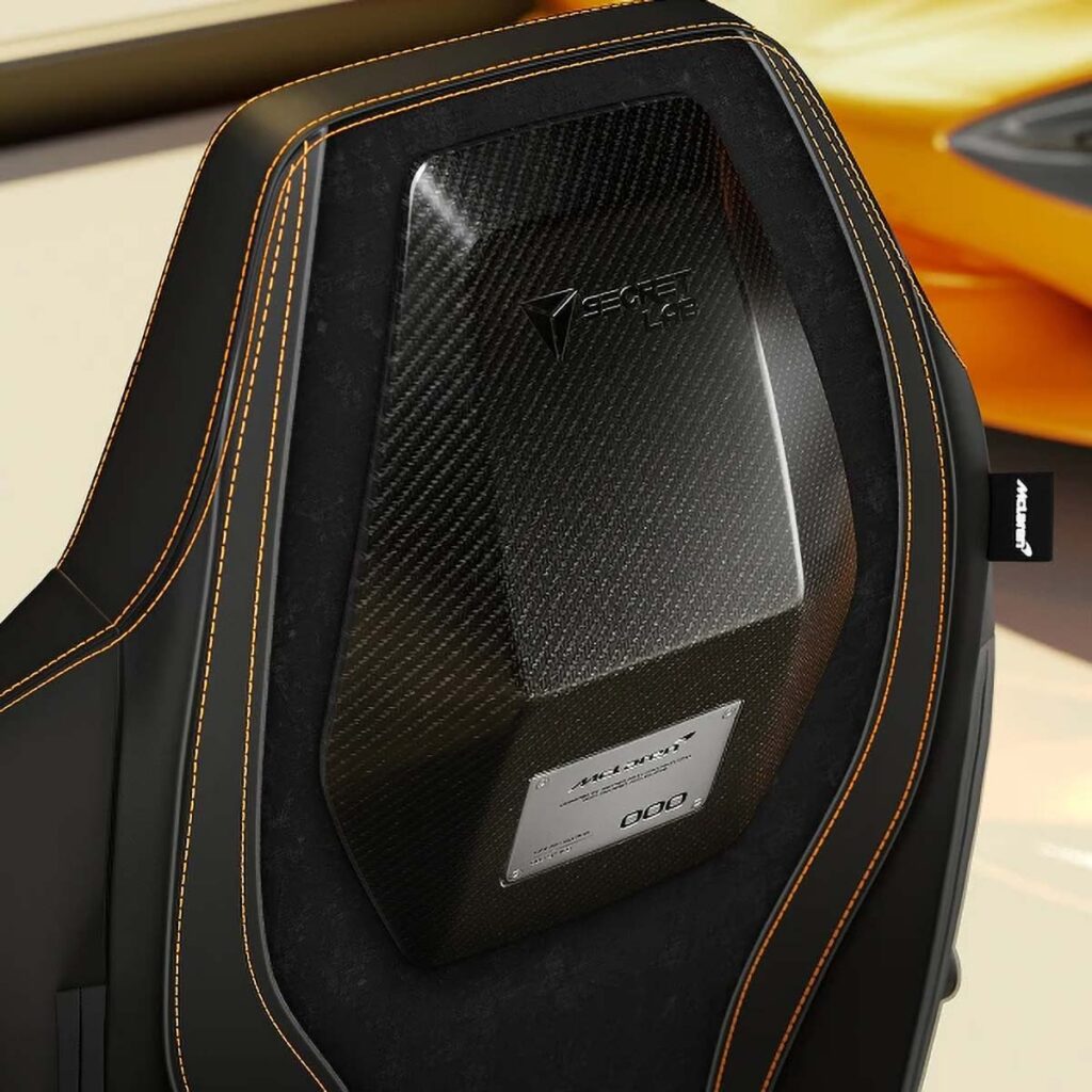 Secretlab McLaren MonoCell Edition gaming chair featuring a single-piece carbon fiber MonoCell chassis and Dinamica microsuede upholstery