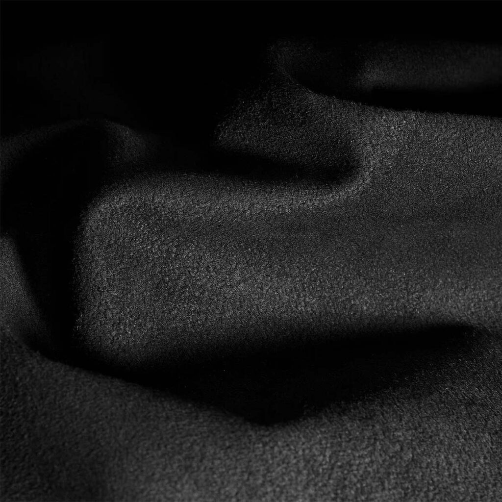 Secretlab McLaren MonoCell Edition gaming chair featuring a single-piece carbon fiber MonoCell chassis and Dinamica microsuede upholstery