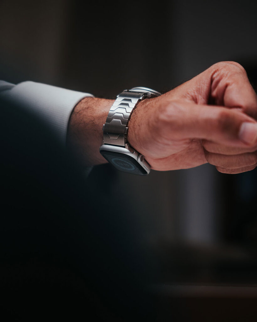 Smartlet dual watch band showing a mechanical watch on top of the wrist and a smartwatch worn underneath