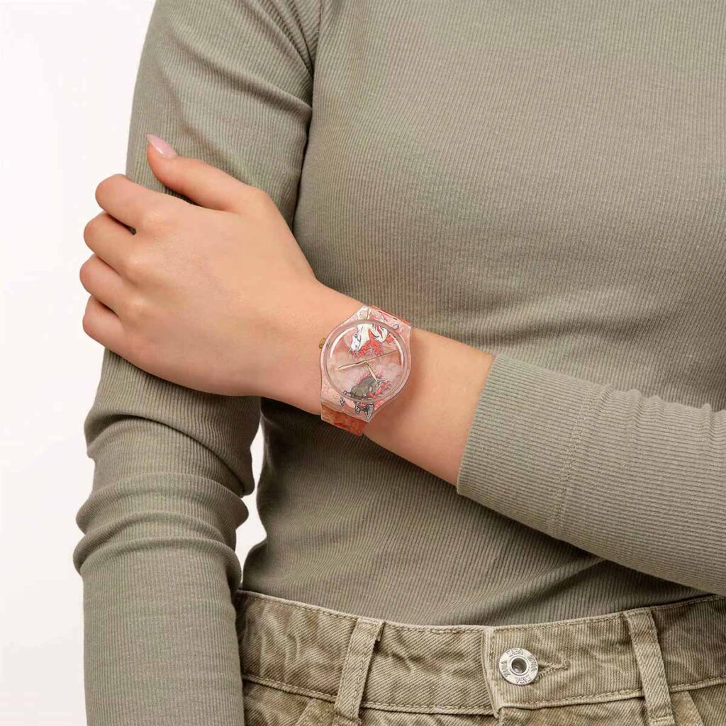 Swatch Year of the Horse Riding the Clouds watch with fiery horse artwork and transparent case