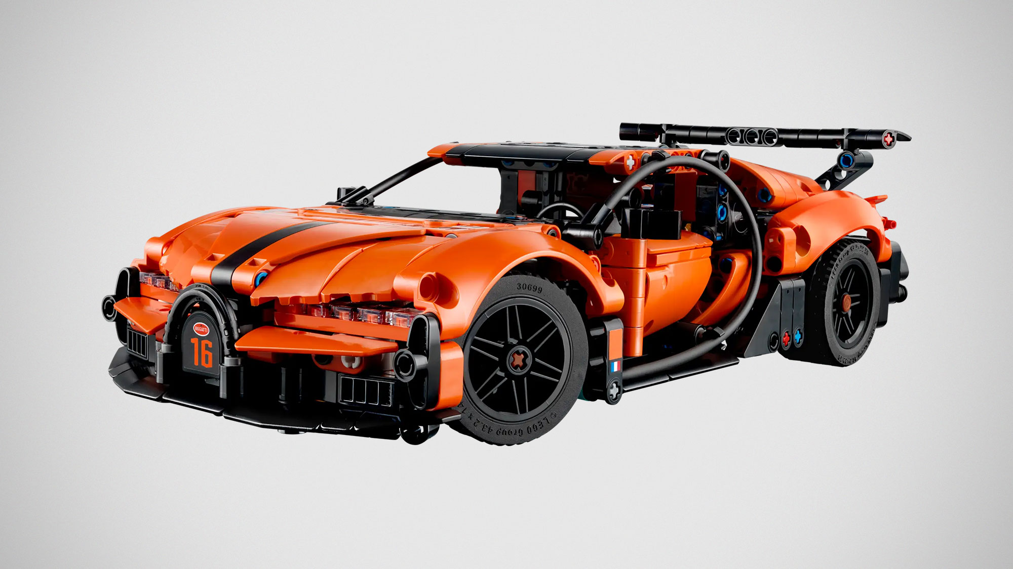 LEGO Technic Bugatti Chiron Pur Sport Hypercar 42222 built model showing orange and black bodywork and detailed W16 engine