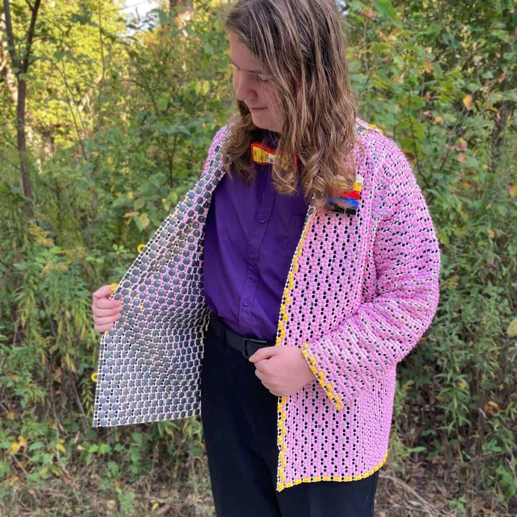 Custom wearable LEGO jacket made from 19000 LEGO pieces created by MOC builder arty_builds