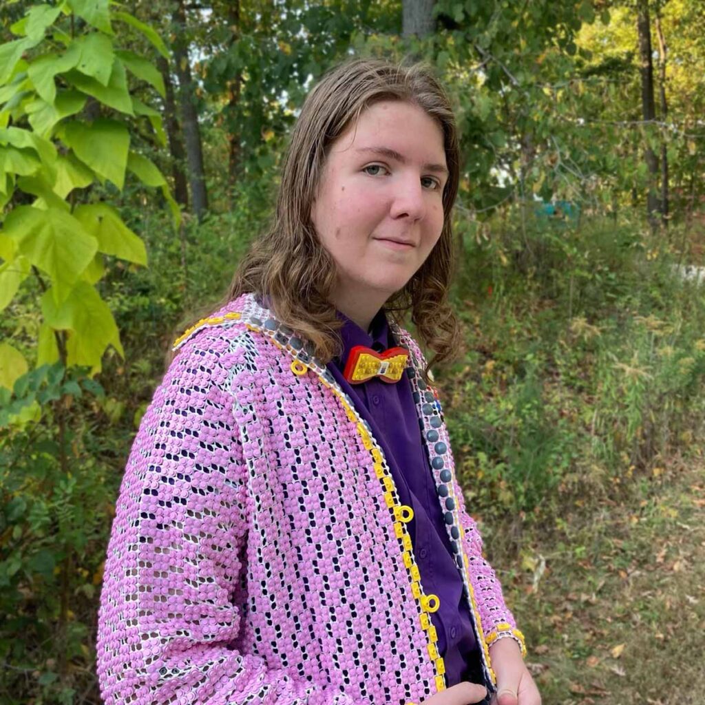 Custom wearable LEGO jacket made from 19000 LEGO pieces created by MOC builder arty_builds