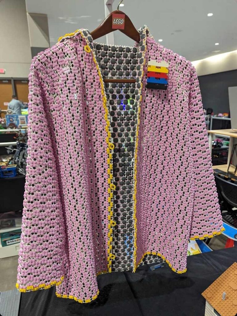 Custom wearable LEGO jacket made from 19000 LEGO pieces created by MOC builder arty_builds