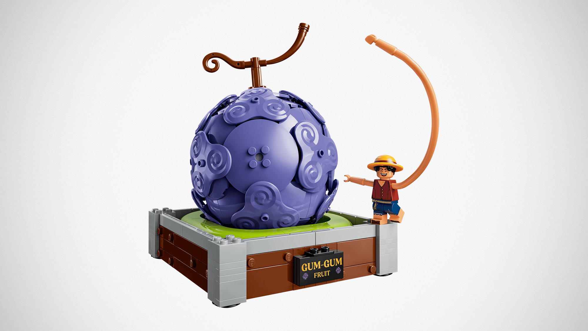 LEGO One Piece Gum-Gum Fruit 75647 set with spiral Devil Fruit design and Luffy minifigures