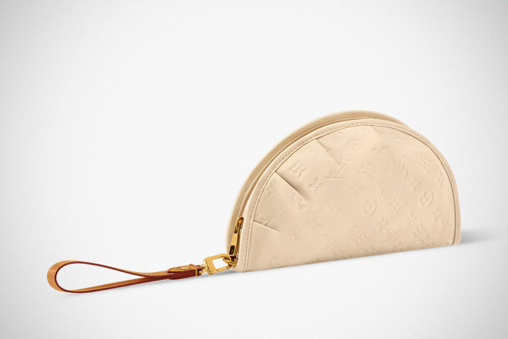 Louis Vuitton Gyoza Pouch in beige Monogram leather with dumpling-inspired folded design