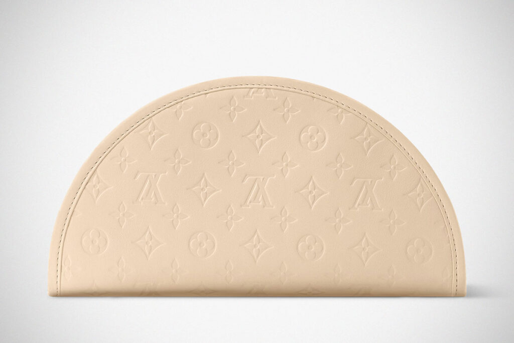 Louis Vuitton Gyoza Pouch in beige Monogram leather with dumpling-inspired folded design
