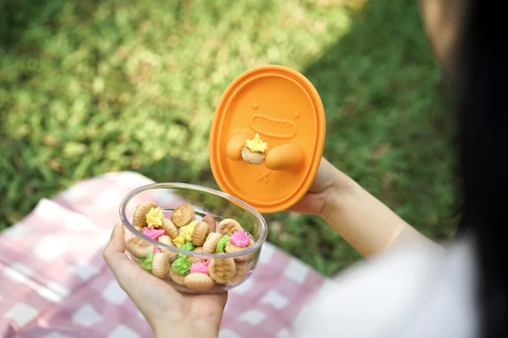 Monchi snack box with silicone finger gloves lid designed for contactless mess-free snacking