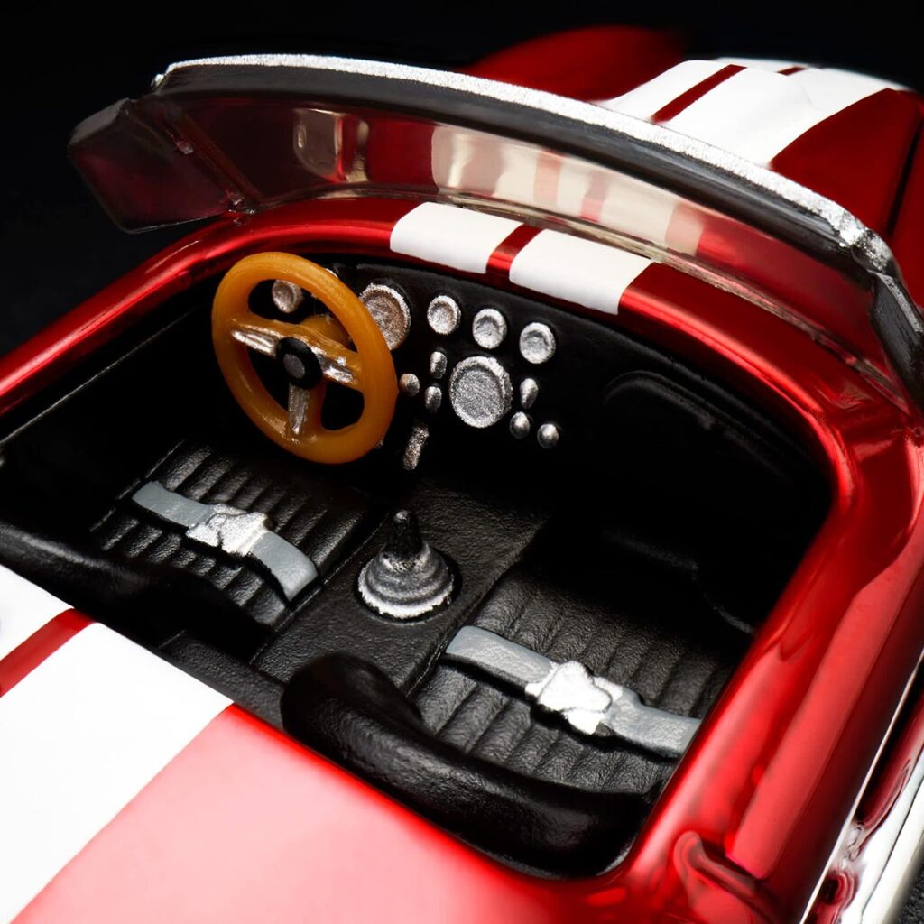 Hot Wheels Red Line Club 1965 Shelby Cobra 427 S/C in Spectraflame red with opening hood and Real Riders wheels