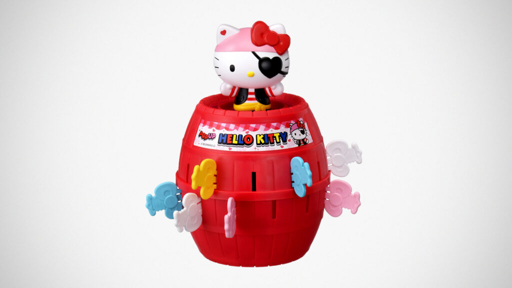 Takara Tomy Pop-Up Hello Kitty pirate toy featuring Hello Kitty in pirate outfit inside a red barrel with colorful plastic swords