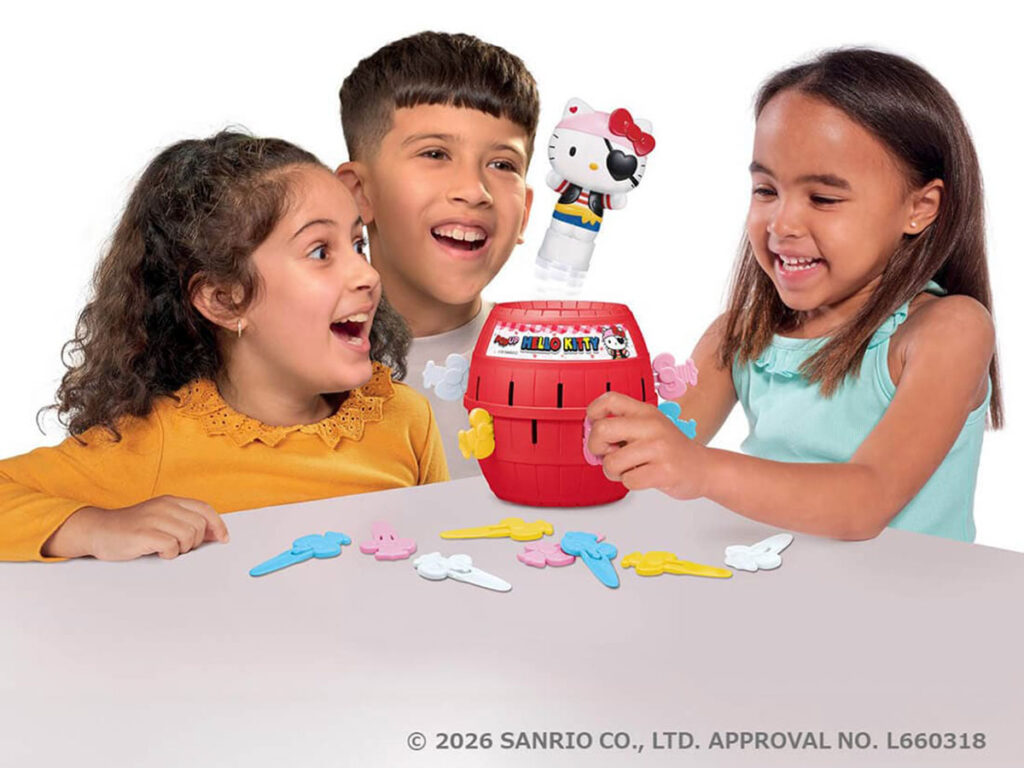 Takara Tomy Pop-Up Hello Kitty pirate toy featuring Hello Kitty in pirate outfit inside a red barrel with colorful plastic swords