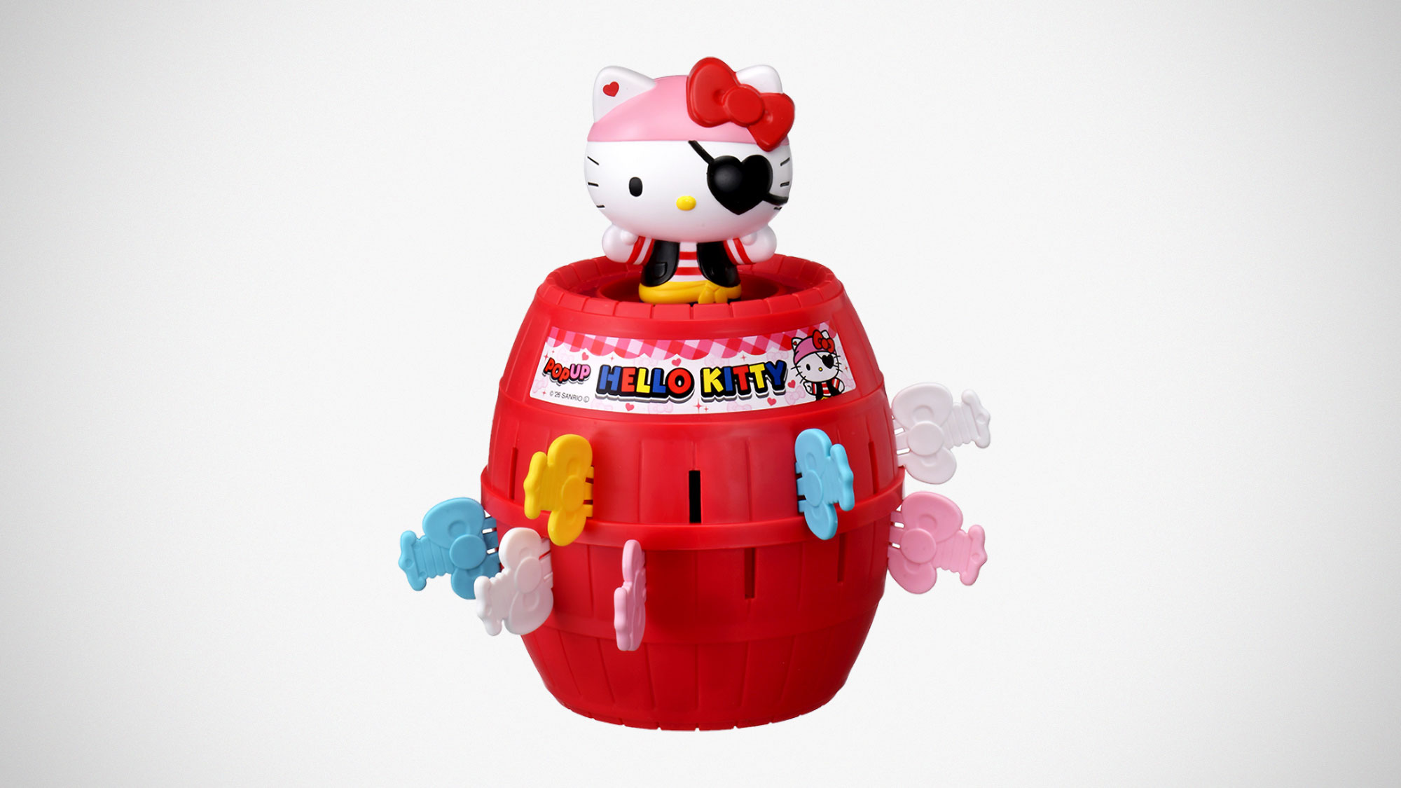 Takara Tomy Pop-Up Hello Kitty pirate toy featuring Hello Kitty in pirate outfit inside a red barrel with colorful plastic swords