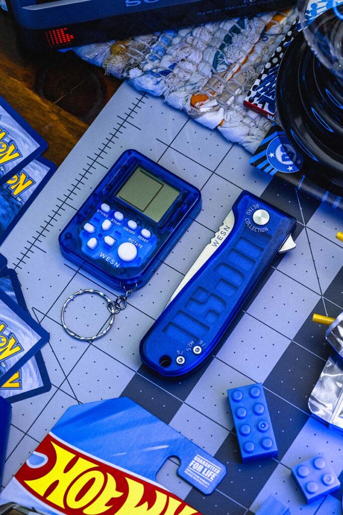 WESN Retro Collection Allman and Microblade knives with translucent Arcadite handles and WESNBoy keychain console