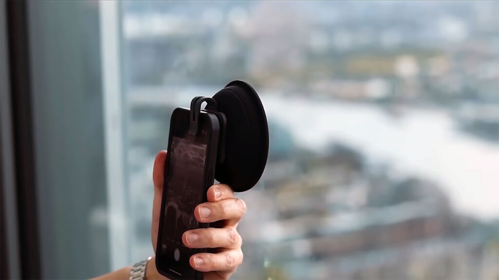 Ultimate Lens Hood ULHpro silicone hood attached to camera lens for shooting through glass without reflections