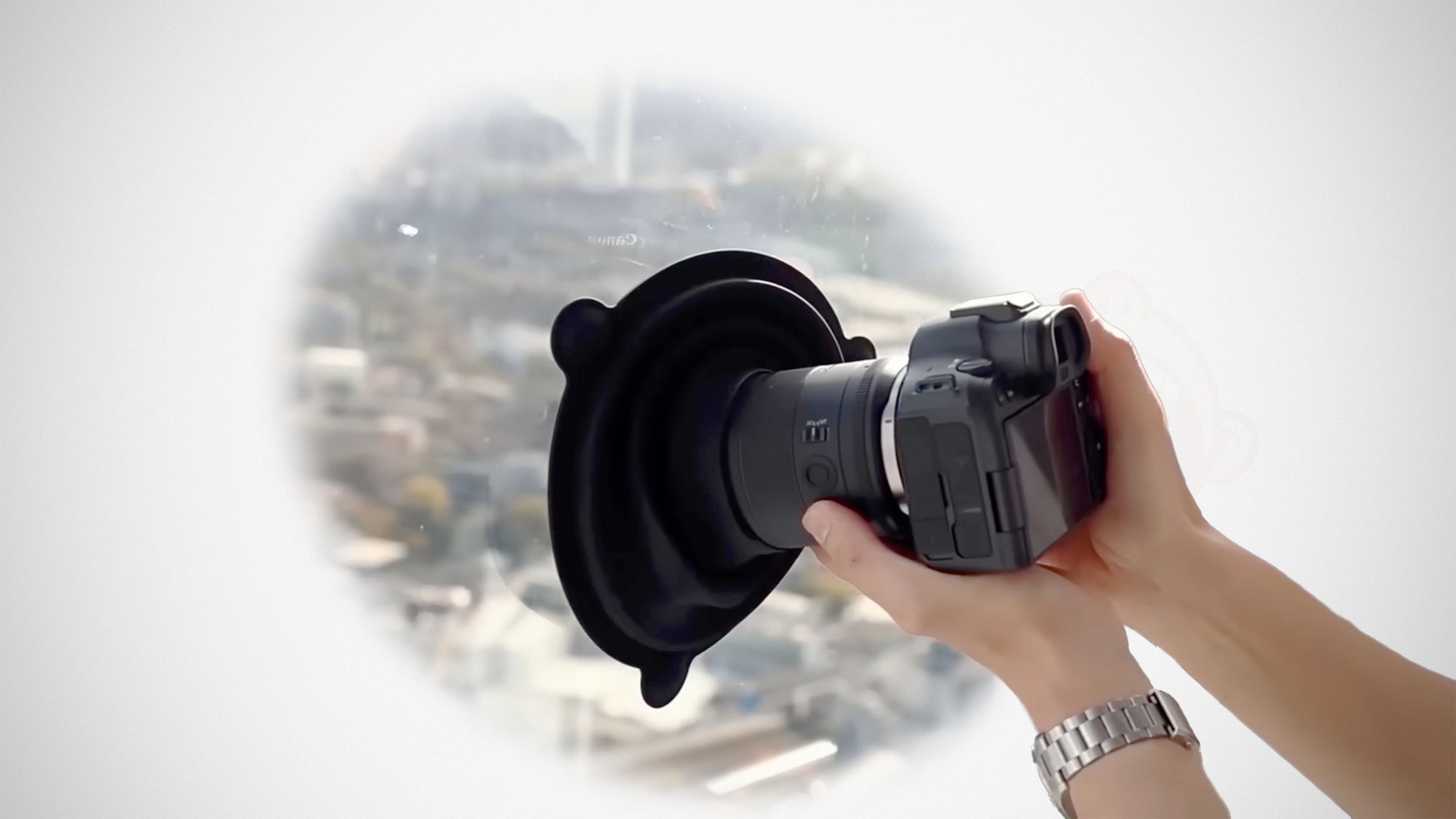 Ultimate Lens Hood ULHpro silicone hood attached to camera lens for shooting through glass without reflections