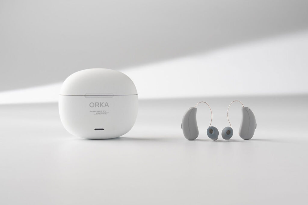Orka O1 Pro hearing aid with Bose QuietControl ANC technology and wireless charging case